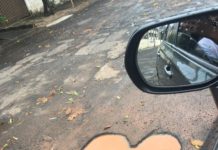 Reclamação da População: Rua em frente a Escola Alfredo Machado cheia de buracos