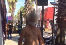 Homem caminha nu e com máscara no centro de Votuporanga